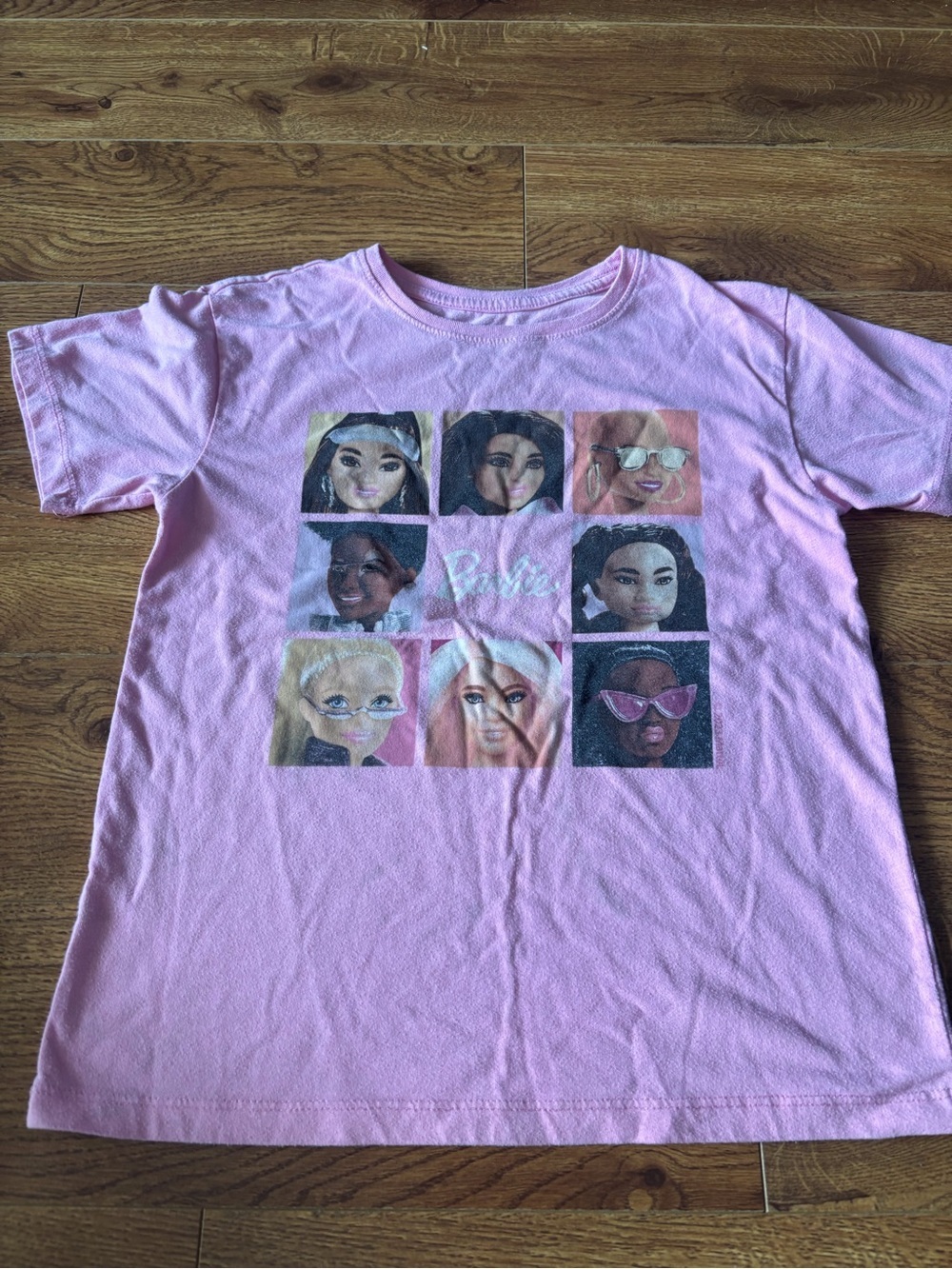 Barbie Pink Short Sleeve Tee with Multicolor Doll Portrait Grid